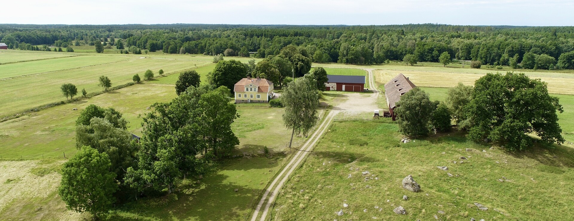 Trävattna Lund - Gård vid Lidan